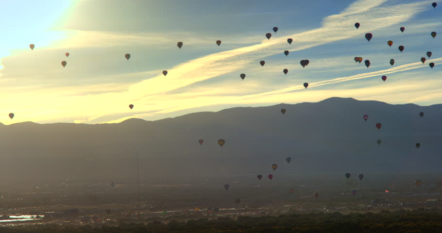 This is a time lapse show of hot air balloons flying the box in albuquerque during the balloon fiesta. The Box is where wind blows to the south lower and higher up it blows to the north. Allowing the 