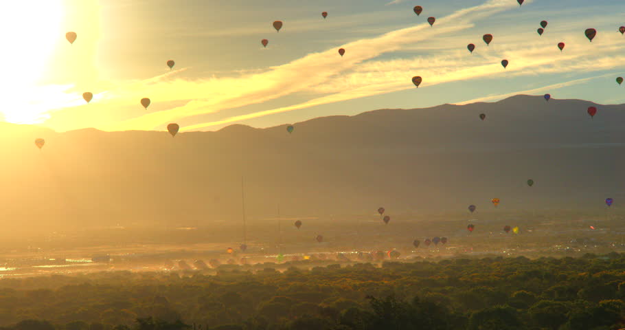 This is a shot of balloons taking off and flying the box in albuquerque during the 2023 balloon fiesta