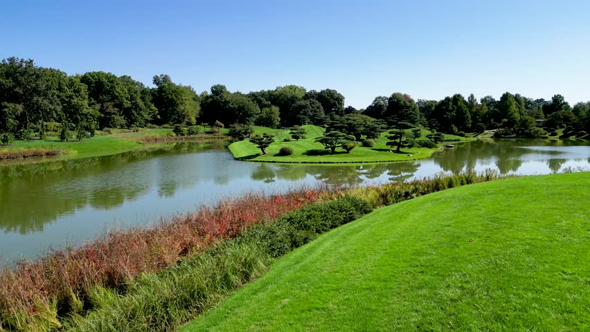 High resolution 4K beautiful drone aerial panoramic Video of the famous Chicago Botanical Gardens during a sunny beautiful day- USA