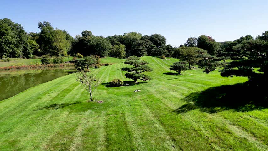High resolution 4K beautiful drone aerial panoramic Video of the famous Chicago Botanical Gardens during a sunny beautiful day- USA