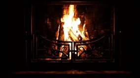 Cozy Fireplace in a dark room of a Cabin in Mountains. - Powered by Shutterstock - Get 15% off with code: PIKWIZARD15