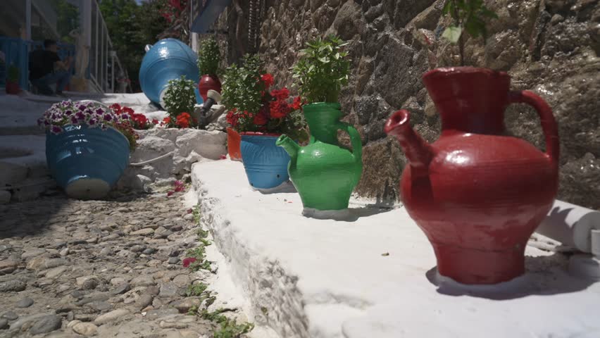 Colourful jugs and whitewashed walls in Kos Town, Kos Town, Kos, Dodecanese, Greek Islands, Greece, Europe Royalty-Free Stock Footage #1110403321