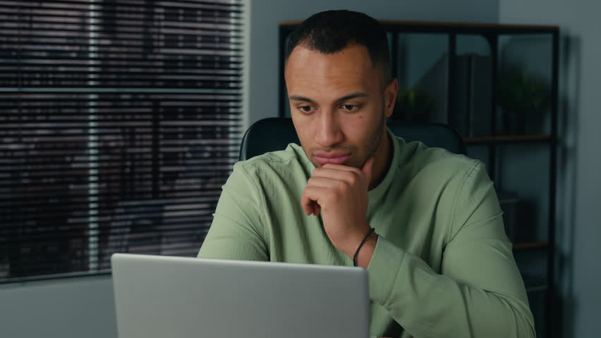 Excited happy african american man businessman winner checking email reading good news on laptop in office celebrate business success online victory get great opportunity career growth new job offer Royalty-Free Stock Footage #1110407799