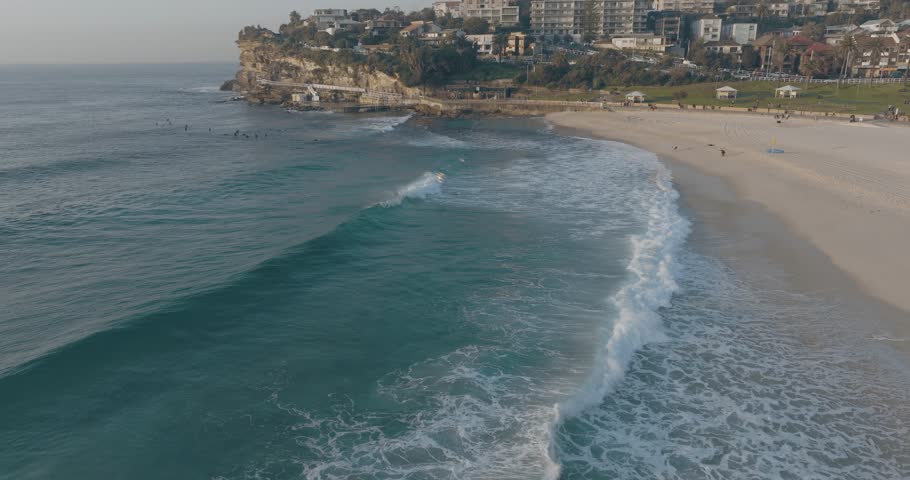 Aerial view of Bronte, a beachside Eastern Suburb of Sydney at sunset along the coastline, New South Wales, Australia.