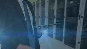 Animation of data processing over caucasian businessman using tablet by computer servers. Global business, computing, digital interface and data processing concept digitally generated video. - Powered by Shutterstock - Get 15% off with code: PIKWIZARD15