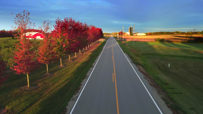 Amazing peak Fall colors, mid October, in Wisconsin, moving aerial view.
