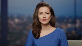 Happy anchor woman talking to camera modern television studio presenting man guest closeup. Unknown guy greeting with young host in entertainment program. Beautiful lady smiling conducting tv show. - Powered by Shutterstock - Get 15% off with code: PIKWIZARD15