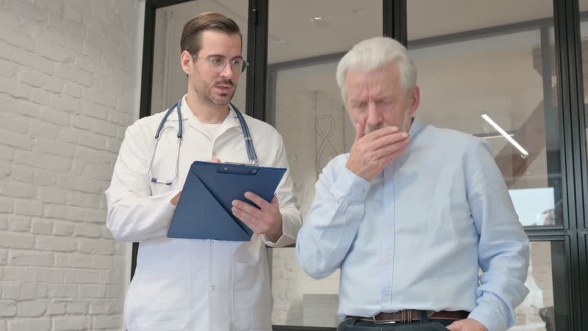 Coughing Old Man Discussing Health issues with Doctor Royalty-Free Stock Footage #1110441811