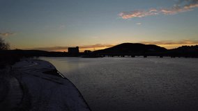 Flying a drone over Drammen Fjord, Norway on a sunrise morning