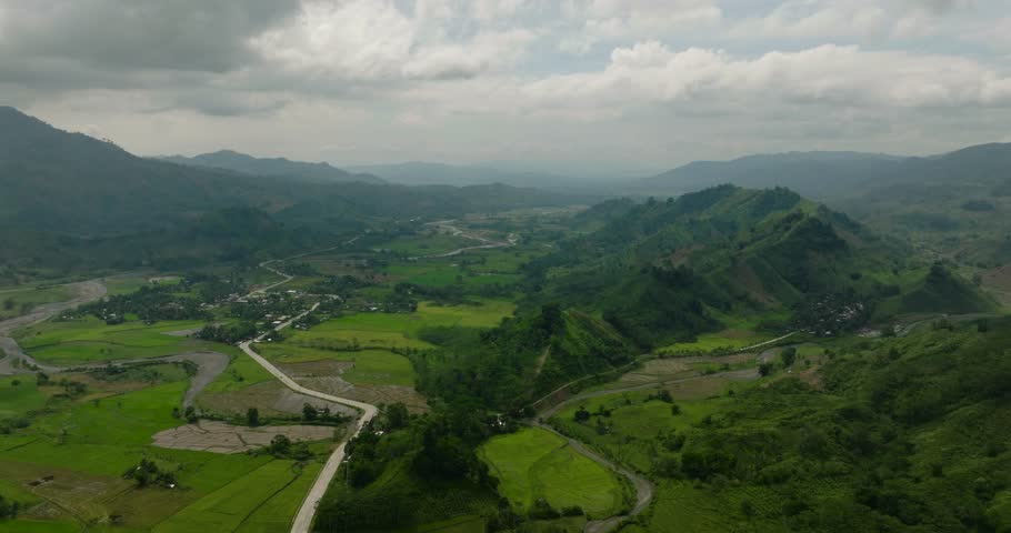 Top view of Mountains with rainforest and agricultural land in a mountainous province in Philippines. Mindanao.