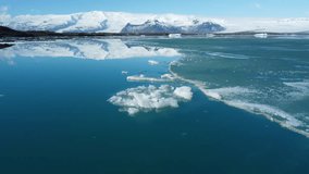 Melting Ice in Jokulsarlon Glacier Lagoon, Huge Icebergs Are Drifting In Calm Water, Arctic Nature Ice Landscape - Powered by Shutterstock - Get 15% off with code: PIKWIZARD15