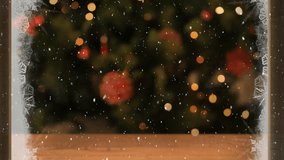 Animation of happy holidays and happy new year text over window, snow and christmas decorations. Christmas, tradition and celebration concept digitally generated video.