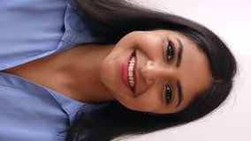 Vertical POV screen view of young indian businesswoman talking with colleague on laptop video call. Head shot of confident professional ethnic female having an online conversation.  - Powered by Shutterstock - Get 15% off with code: PIKWIZARD15