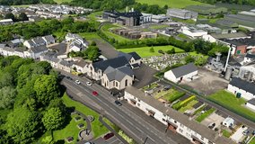 Aerial video of Bushmills Presbyterian Church on the North Coast of Co Antrim Northern Ireland