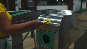 Unrecognizable woman hand scanning train ticket to subway entrance gate. Transportation concept. High quality FullHD footage - Powered by Shutterstock - Get 15% off with code: PIKWIZARD15