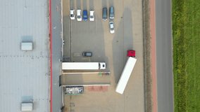 Warehouse storages or industrial factory or logistics center from above. Aerial view of industrial buildings and equipment machines. Aerial view - Powered by Shutterstock - Get 15% off with code: PIKWIZARD15