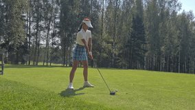 Golfer sports golf course and fairway. People lifestyle woman playing golf on green grass - Powered by Shutterstock - Get 15% off with code: PIKWIZARD15