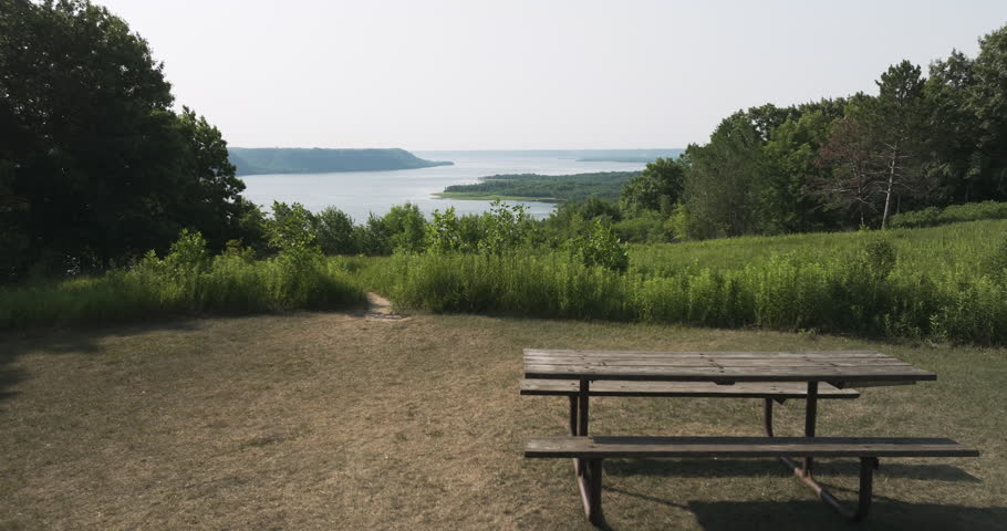 Wooden Picnic Table And Grassy Hills At Frontenac State Park In Minnesota, USA. - aerial