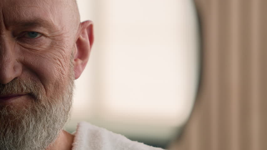 Close up cropped view half of wrinkled male face old Caucasian male senior happy smiling toothy mature retired pensioner man smile dental skin care teeth implant medicine service gray beard indoors