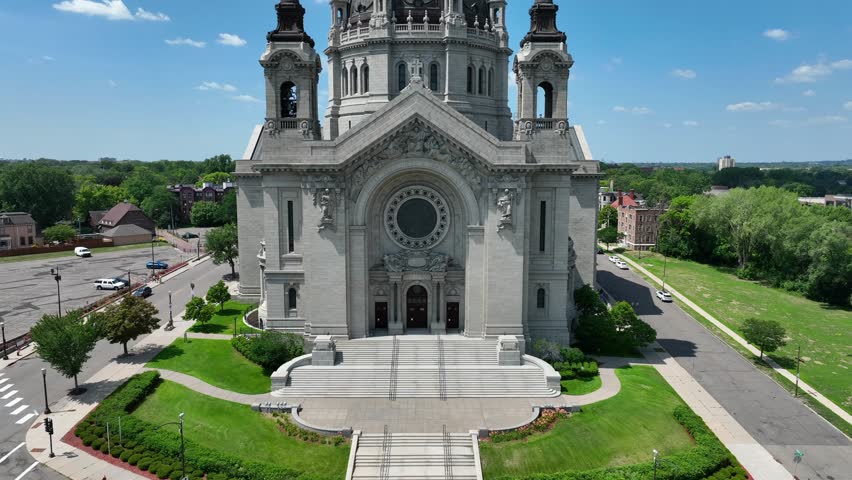 Ornate cathedral in Saint Paul, Minnesota on summer day. Aerial rising shot of Cathedral of Saint Paul, National Shrine of the Apostle Paul.
