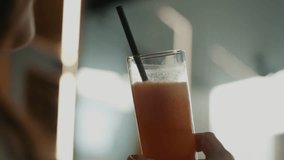 Close Up Of Woman Drinking Through Straw. - Powered by Shutterstock - Get 15% off with code: PIKWIZARD15
