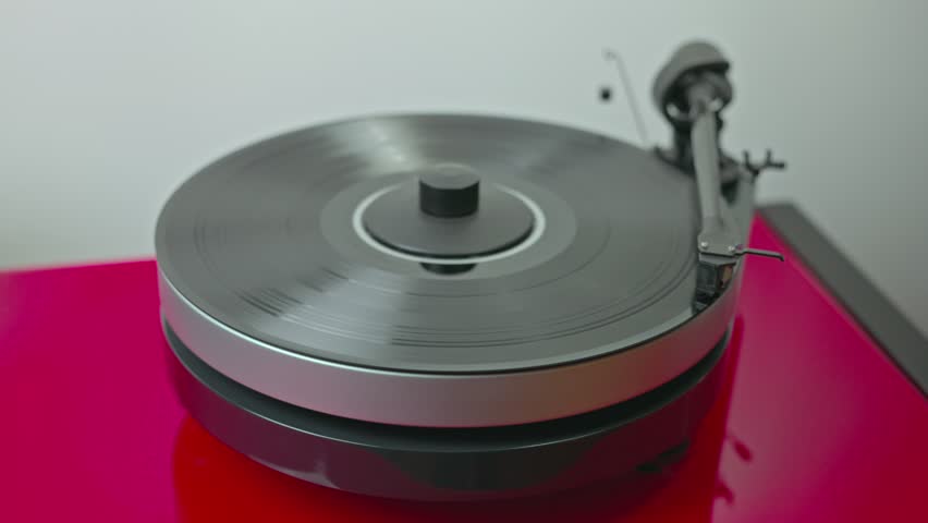 Close-up view of vinyl record playing on hi-fi turntable. | Shutterstock HD Video #1110547993