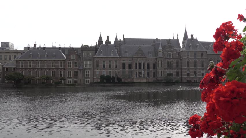 Binnenhof Palace in The Hague beside the Hohvijfer canal. Netherlands - Dutch Parliament buildings.
