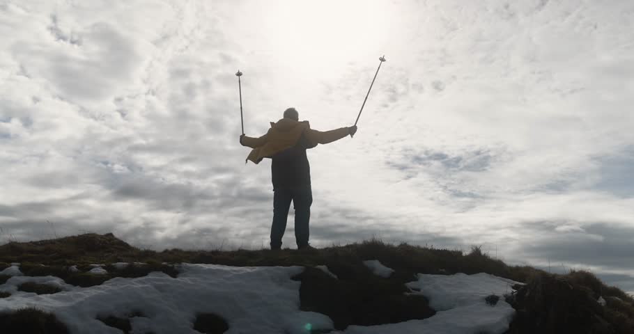Senior man with arms raised on nature mountain peak during hiking day - Travel, winter and adventure concept Royalty-Free Stock Footage #1110551773