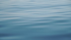 Sea water surface. Low angle view from kayak, camera flies over clear sea water. Nobody. Holiday recreation concept. Abstract nautical summer ocean nature. Slow motion. Close up. Vertical video