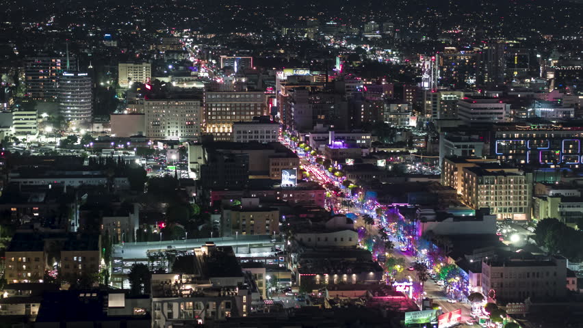 Establishing Aerial View Shot of Los Angeles LA CA, L.A. California USA, at night evening, super clear image, Hollywood, Walk of Fame, Hollywood City, Hollywood Boulevard, TCL Chinese Theatre, lights