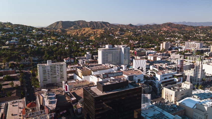 Establishing Aerial View Shot of Los Angeles LA CA, L.A. California USA, sunny day, Hollywood, Walk of Fame, Hollywood City, Hollywood Boulevard, TCL Chinese Theatre, track back
