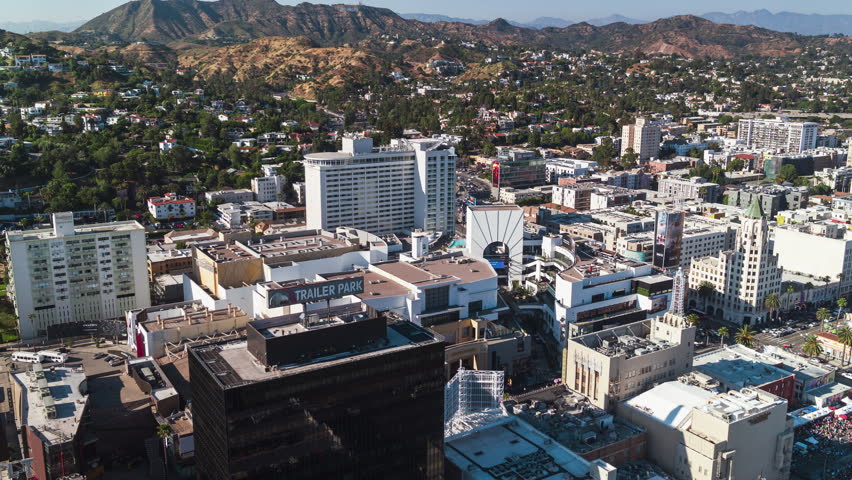 Establishing Aerial View Shot of Los Angeles LA CA, L.A. California USA, sunny day, Hollywood, Walk of Fame, Hollywood City, Hollywood Boulevard, TCL Chinese Theatre, circling