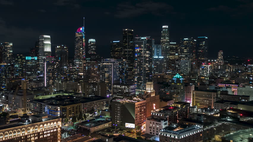 Establishing Aerial View Shot of Los Angeles LA CA, L.A. California USA, at night evening, super clear image, LA Skyline, busy freeway, downtown LA, DTLA, close Royalty-Free Stock Footage #1110569891