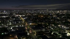 Establishing Aerial View Shot of Los Angeles LA CA, L.A. California USA, at night evening, super clear image, endless city, deep night