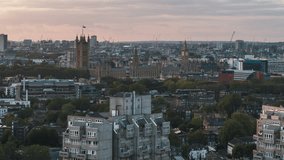 Establishing Aerial View Shot of London UK, United Kingdom, day, Westminster, circling right low, overcast