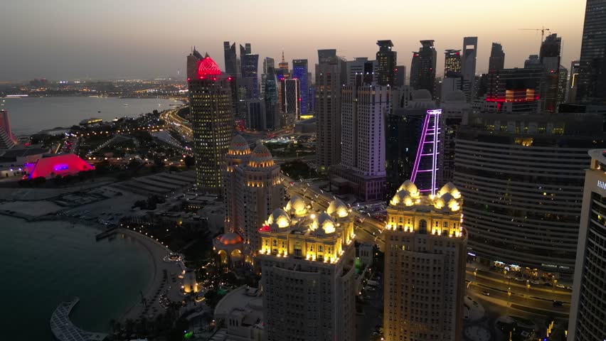 Skyscrapers at night in West Bay area of Doha (Ad-Dauha), capital of Qatar