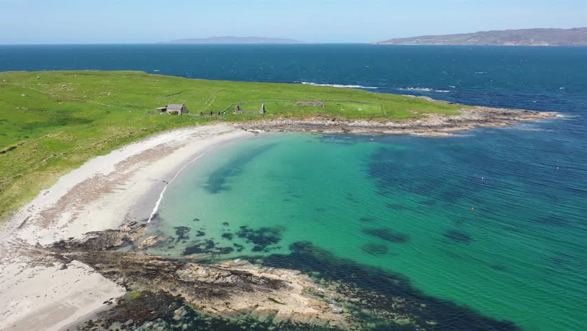 Aerial view of Inishkeel Island by Portnoo in County Donegal, Ireland. Royalty-Free Stock Footage #1110575635