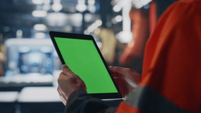 Factory specialist hands holding green screen tablet at manufacturing facility close up. Unrecognized engineer in uniform using mockup gadget checking production. Plant worker holding pad computer. - Powered by Shutterstock - Get 15% off with code: PIKWIZARD15