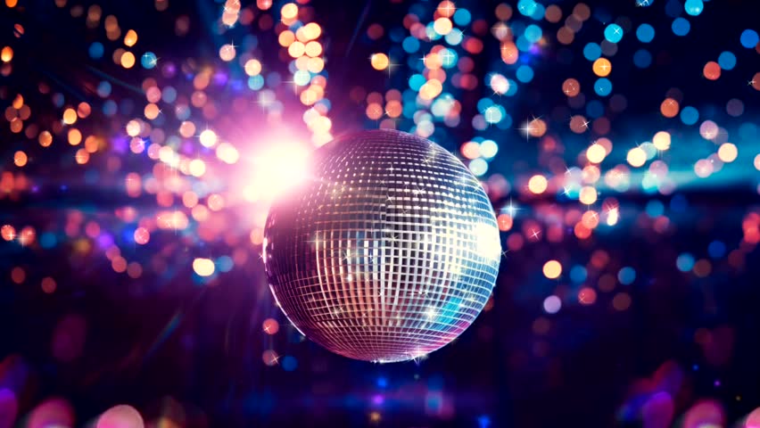 A spinning disco ball. Moving colorful background. Looped animation. Minute Royalty-Free Stock Footage #1110591707
