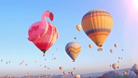 Hot air balloon made in Flamingo shape at balloons festival at Cappadocia, Turkey - Powered by Shutterstock - Get 15% off with code: PIKWIZARD15