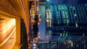 Street traffic in Hong Kong at night timelapse. Office skyscraper buildings and busy traffic on highway road with blurred cars light trails. Hong Kong, China - Powered by Shutterstock - Get 15% off with code: PIKWIZARD15