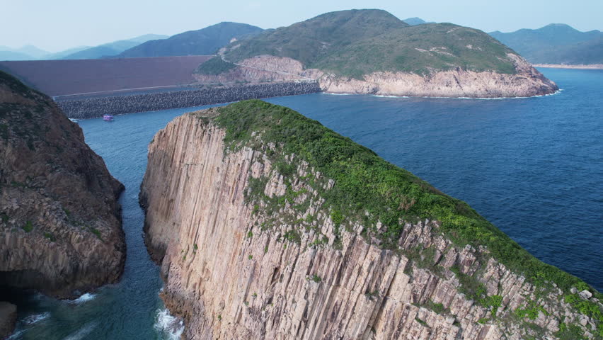 a hexagonal columns landscape in Hong Kong Geopark, at Sai Kung of Po Pin Chau island