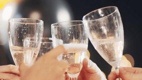 Stylish friends close up celebrating at glamorous merry Christmas new year birthday party making toast drinking champagne at formal social gathering enjoying evening celebration at Eve winter night. - Powered by Shutterstock - Get 15% off with code: PIKWIZARD15