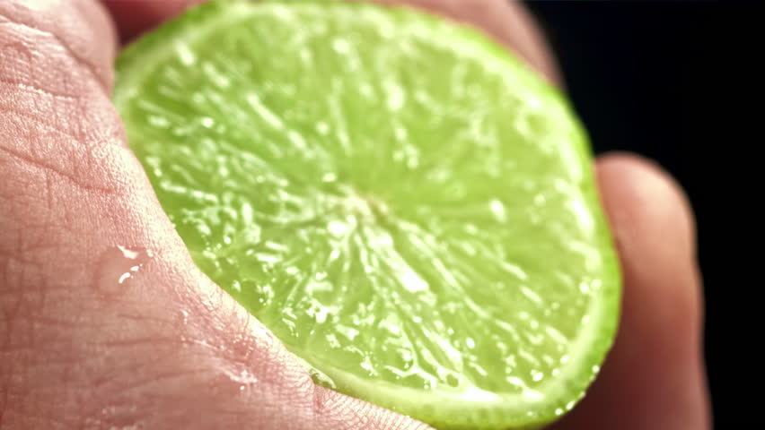 Splash of lime juice. Filmed on a high-speed camera at 1000 fps. High quality FullHD footage