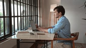Business Man Working in Home Office and Typing on Keyboard of Laptop Computer Close Up. User Looks at Screen of Portable PC Writing Blog Content or Teleworking. Productivity Inspiration for Writers - Powered by Shutterstock - Get 15% off with code: PIKWIZARD15