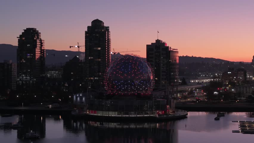 beautiful orbital view at sunrise of science world, vancouver 
