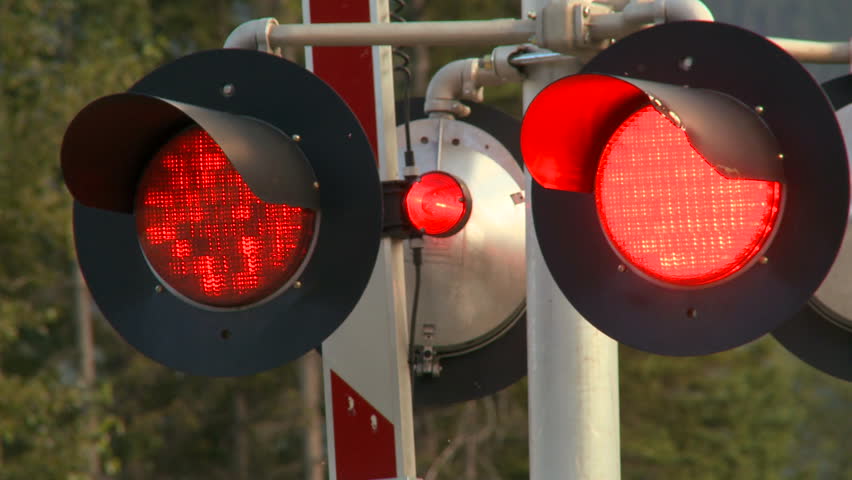 Flashing signals at a level railway crossing