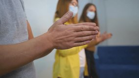 People clap in masks. Group of Patients in medical masks applaud, greeting doctors, people are isolated at home coronavirus. Solidarity movement people corporate group. People medical protection masks - Powered by Shutterstock - Get 15% off with code: PIKWIZARD15