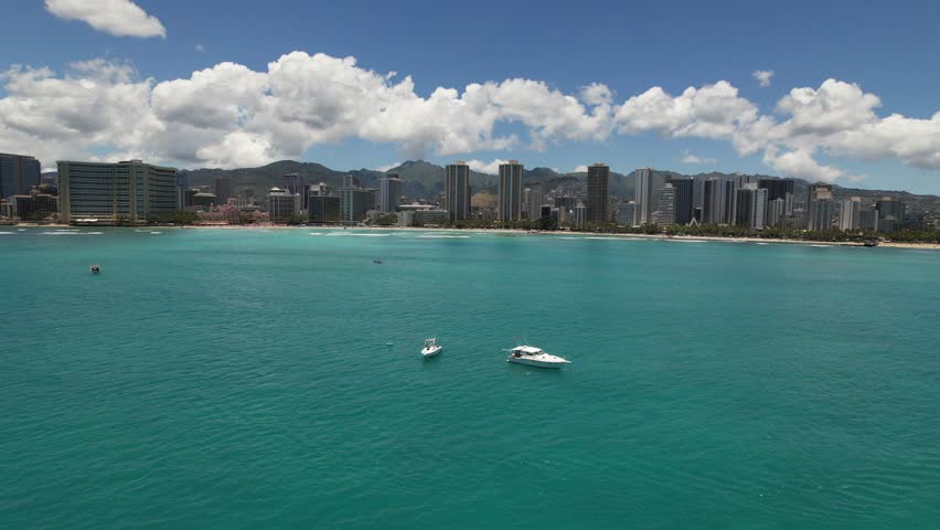 Honolulu aerial pan of city from the ocean