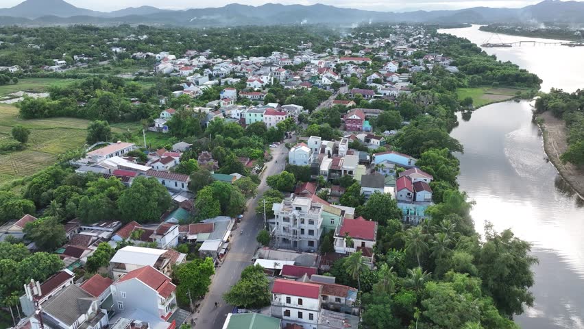 Aerial views of Hue city. Thua Thien Hue province, Vietnam. Old ancient capital under Nguyen dynasty in Vietnam history from 1802 to 1945 year. Beautiful Perfume river. Royalty-Free Stock Footage #1110640021